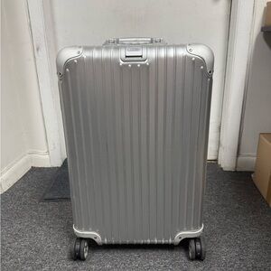 RIMOWA Silver Suitcase Check in  M with bag tracker